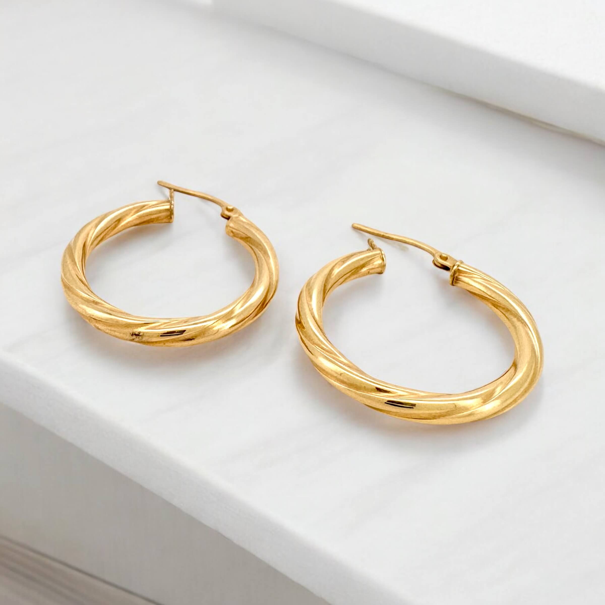 Earrings Crooked 14 KT Hollow Weight 2.4gm