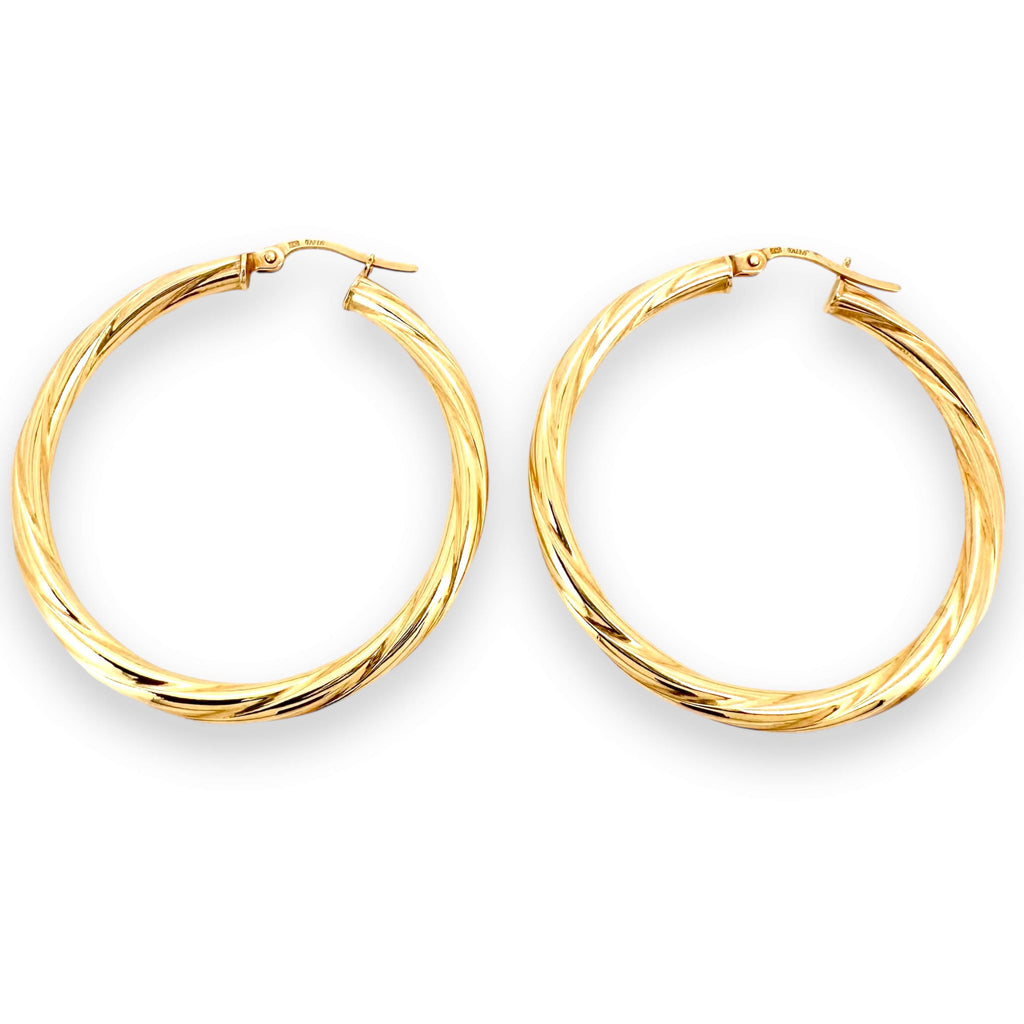 Earrings Crooked 14 KT Hollow Weight 2.4gm