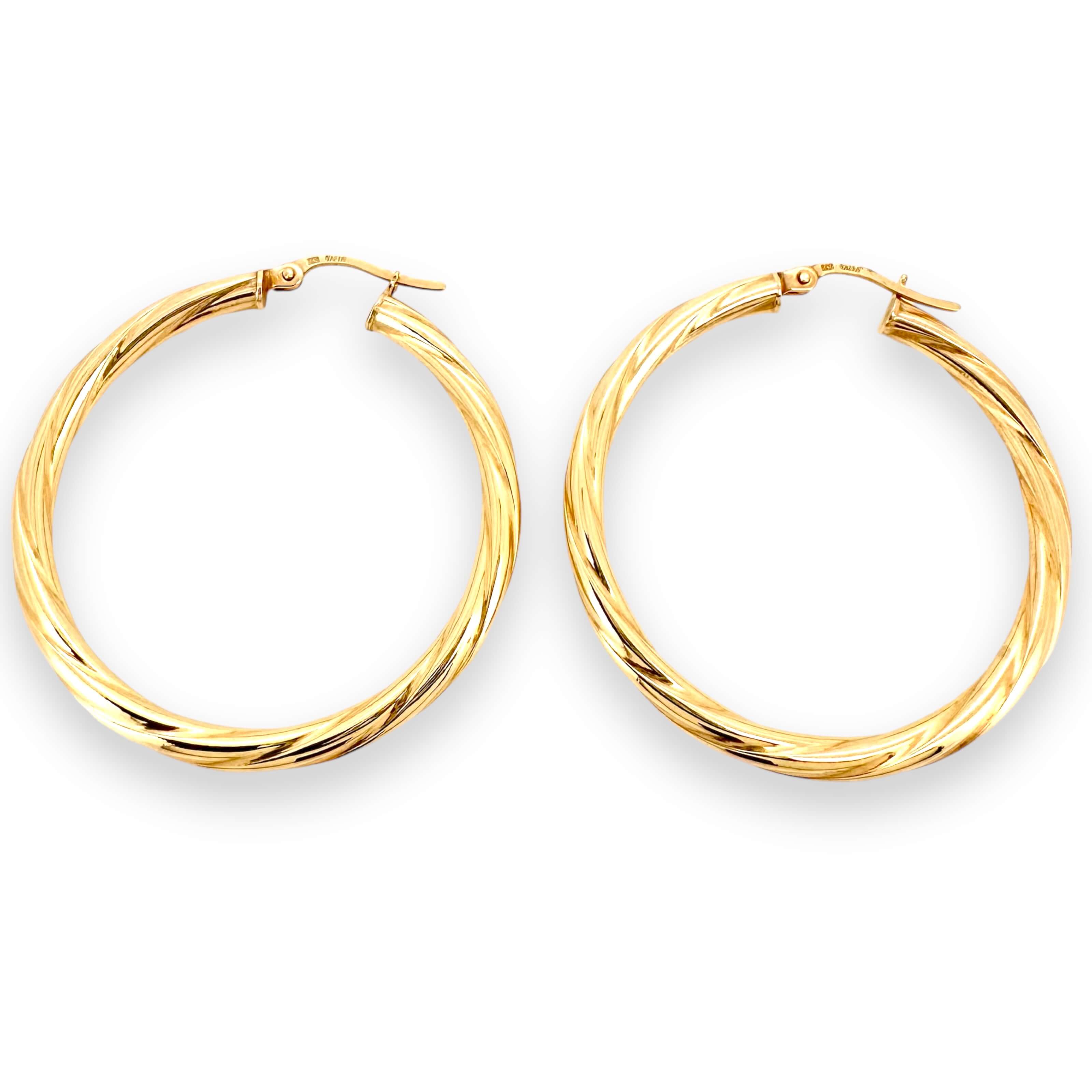 Earrings Crooked 14 KT Hollow Weight 2.4gm