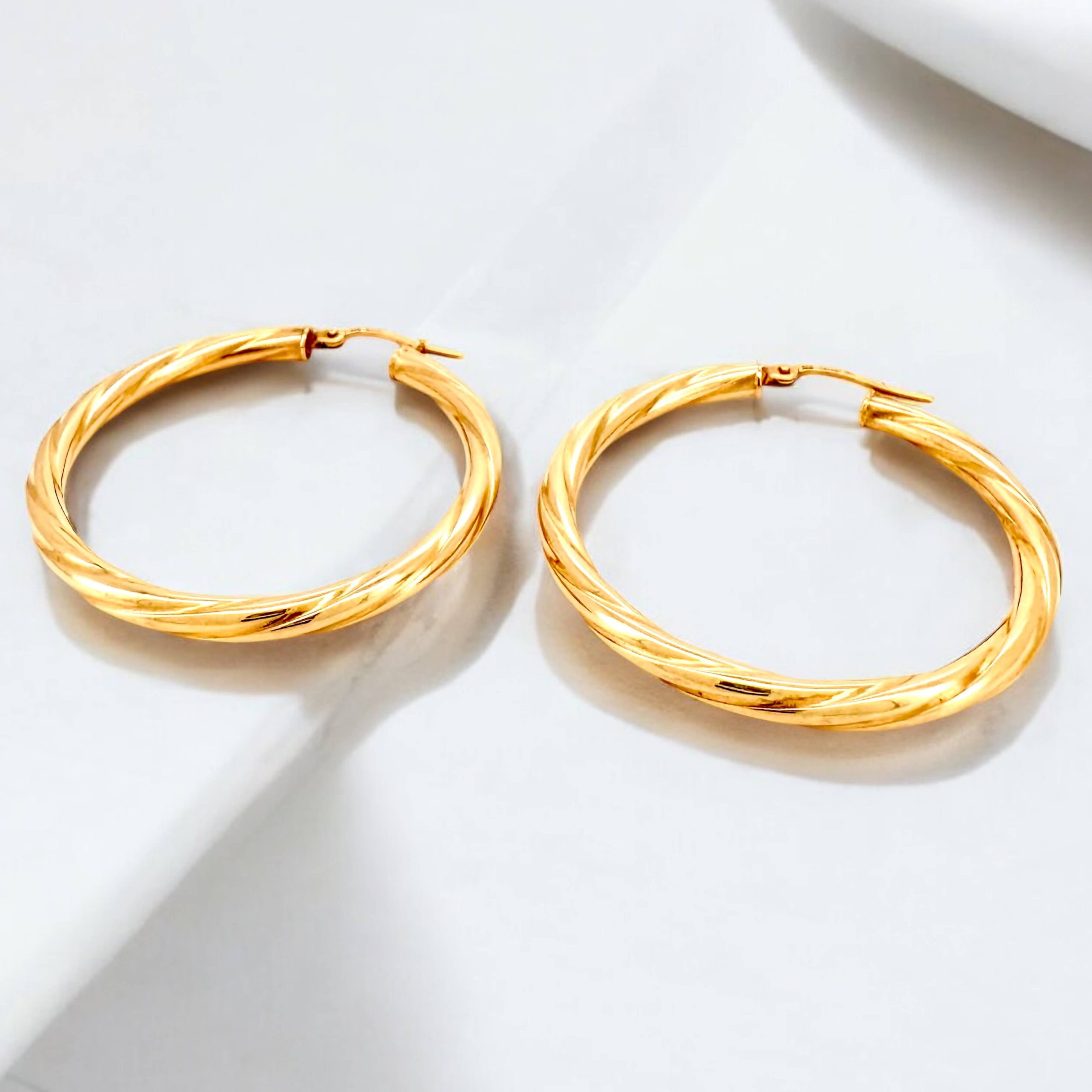 Earrings Crooked 14 KT Hollow Weight 2.4gm